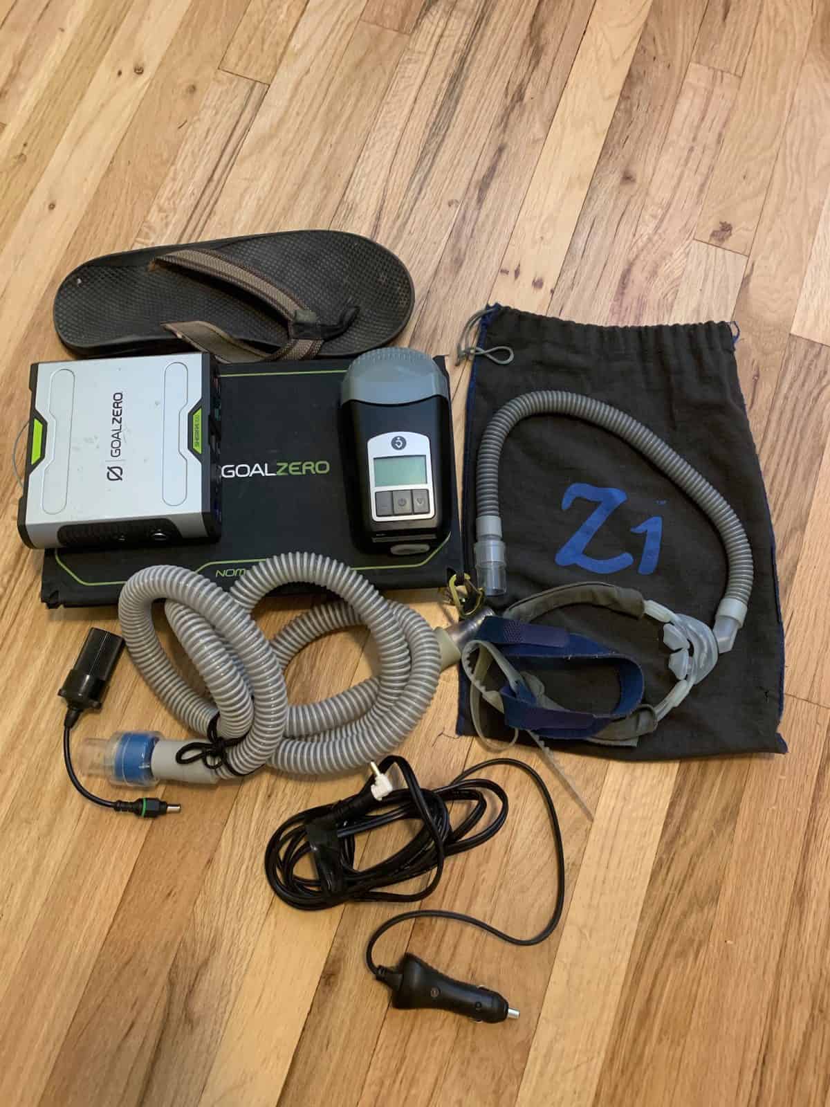 Complete Solar CPAP kit with size 12 Chaco sandal for scale
